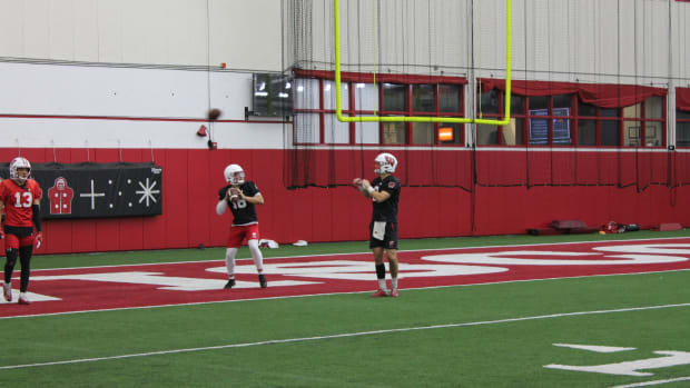 True freshman quarterback Myles Burkett throwing in practice.